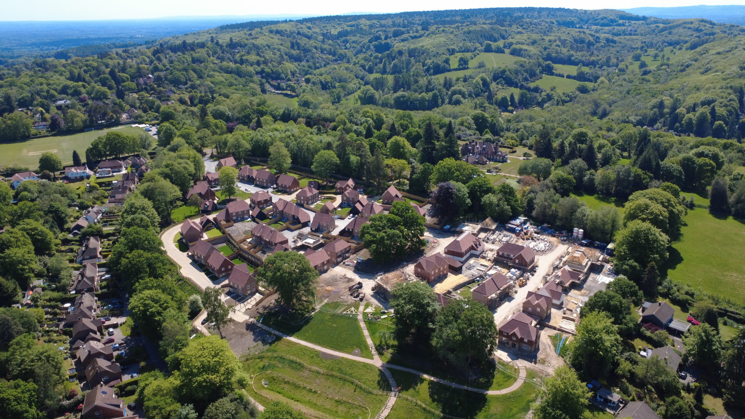 <img src="images/coppice-meadows.jpg" alt="New luxury home at Coppice Meadows, Haslemere, Surrey near South Downs National Park">